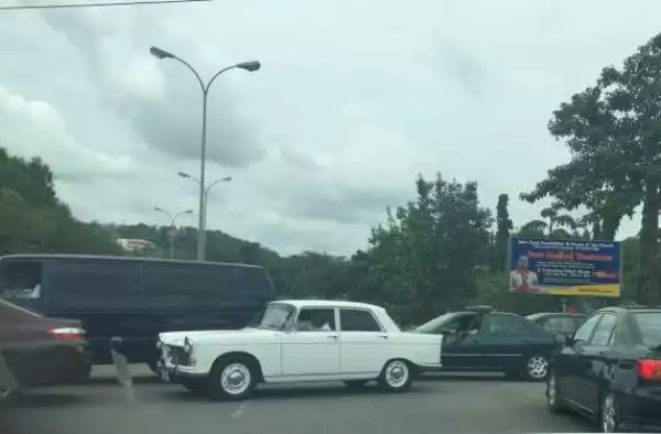 Photos: Senator Dino Melaye Spotted Driving On His Vintage car In Maitama, Abuja